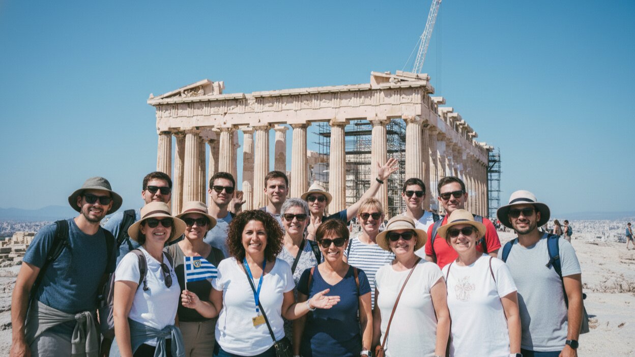 Tourists with tour guide photo
